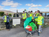 Students litter picking at the Graveyard